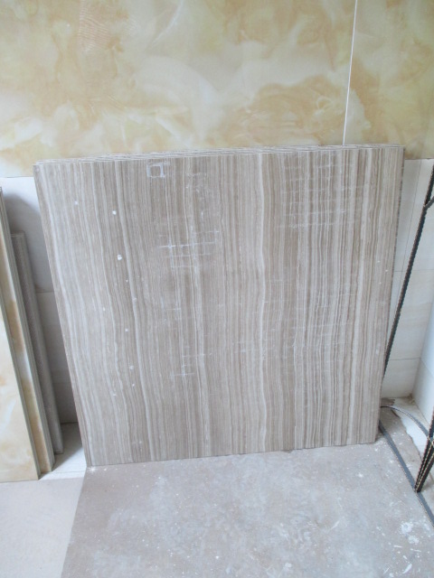 �������ӱ�����ľ��ש��λ